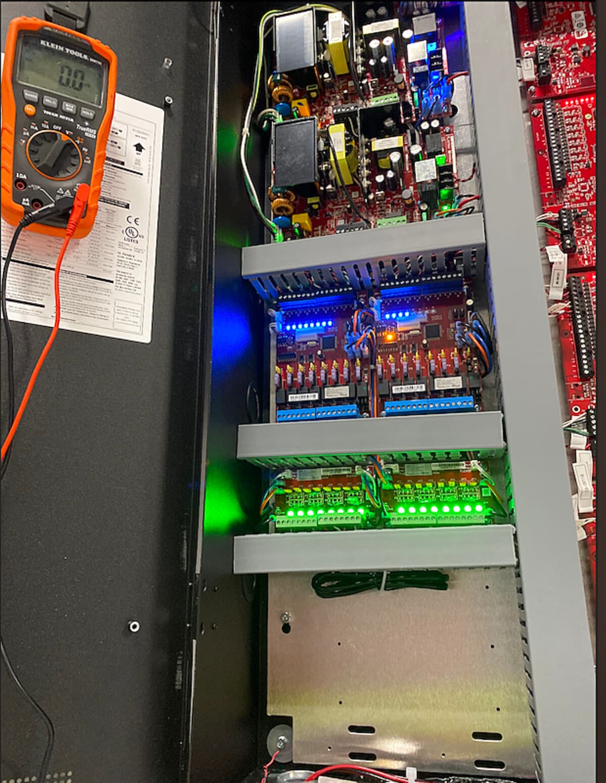 Voltage testing on the access control panel's power and relay boards